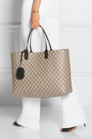 gucci turnaround large reversible bonded-leather tote|Gucci gg supreme reversible tote.